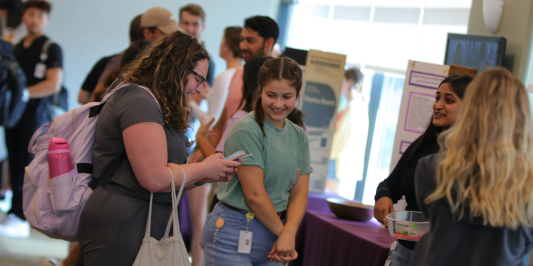 Students network with club leaders. 